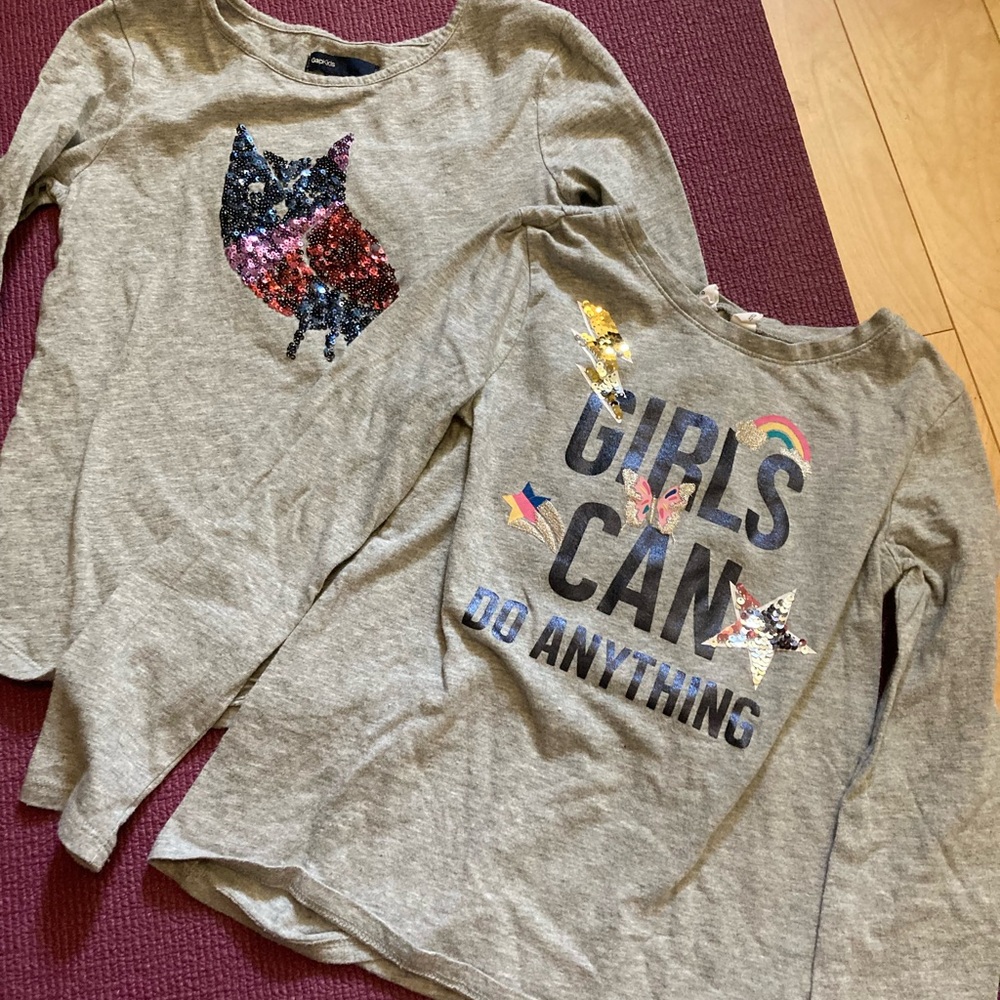 Two like new girls size mediums and small long sleeve tops from the Gap